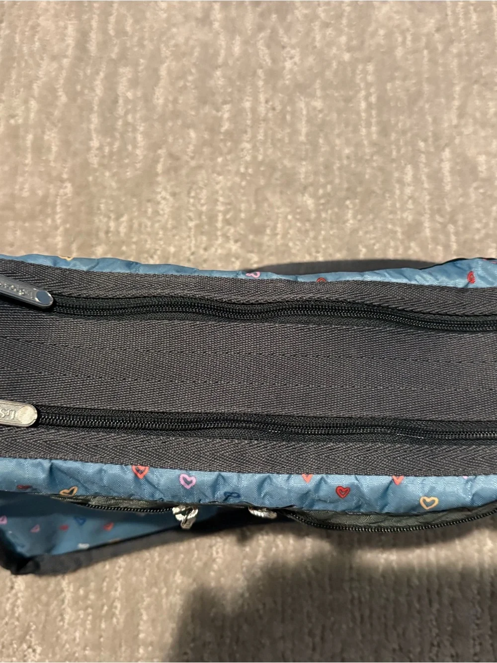 Lesportsac Teal w hearts cross body bag